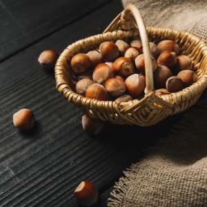 basket-with-nuts-near-cloth